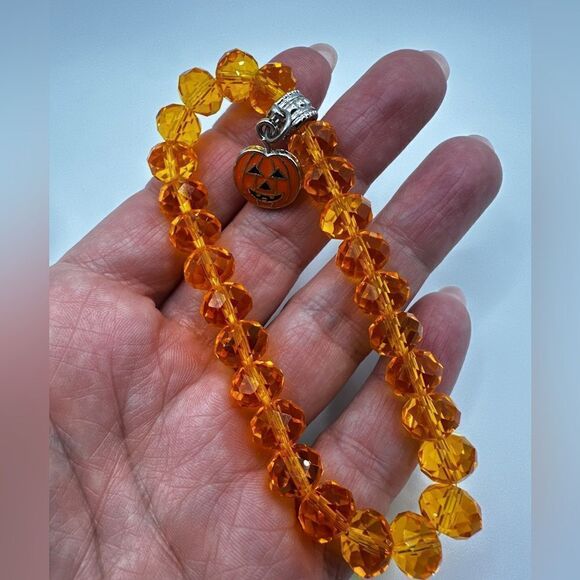 SALE! Faceted orange crystal glass beaded bracelet with jack-o-lantern charm! - Picture 2 of 6